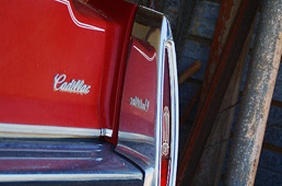 red cadillac & chrome reflection